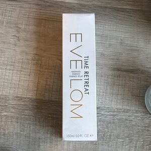 Eve Lom Time Retreat Radiance Essence - Elegant White and Gold
